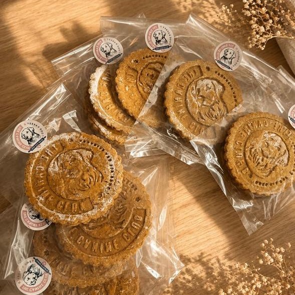 Wrapped dog biscuits stamped with a design